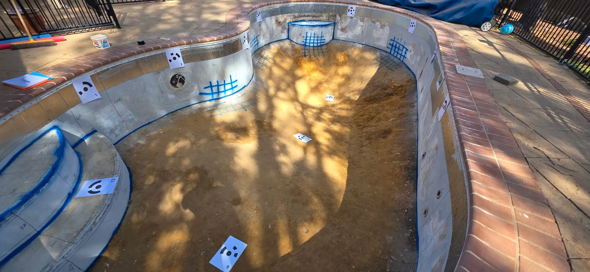 3D measurement markers on pool walls and step entry for custom Aqualux liner fabrication