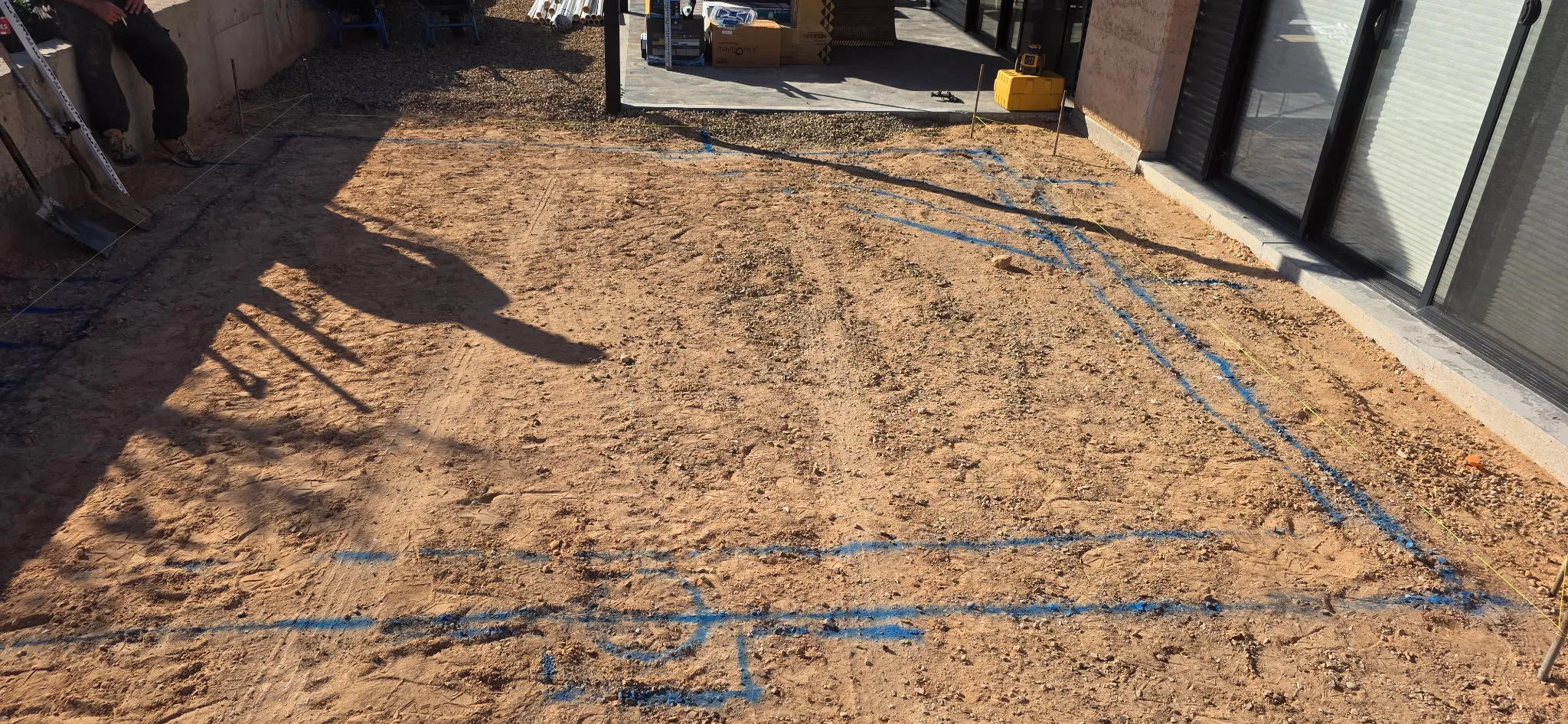 Pool position marked out with blue paint next to modern home at Port Broughton before excavation